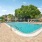 A sparkling in-ground swimming pool
